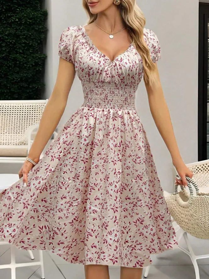Vintage floral dress with fluffy cuffs and pleated waist cinching, suitable for women's summer beach wear and summer parties