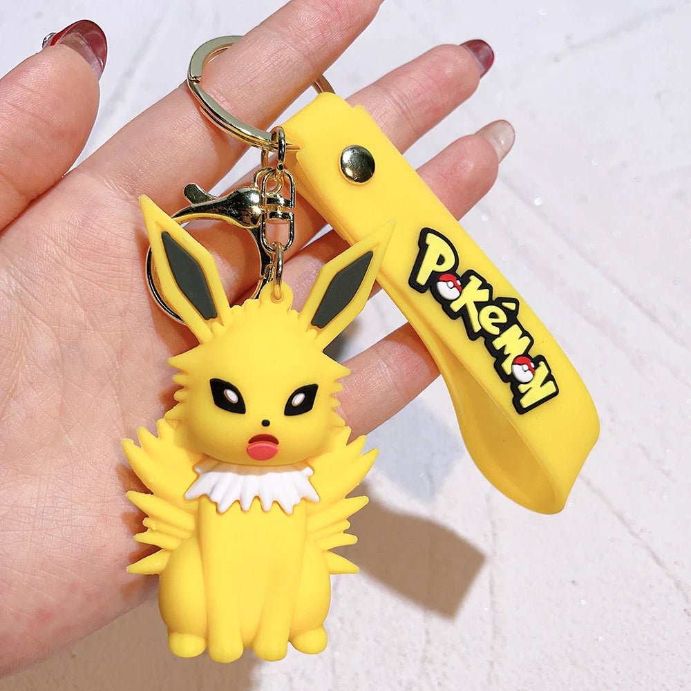 Pokémon Big Eevee Family Keychain Gift Set, Complete Evolution PVC Keychain with Pokéball Clip, Adorable Key Ring for Kid